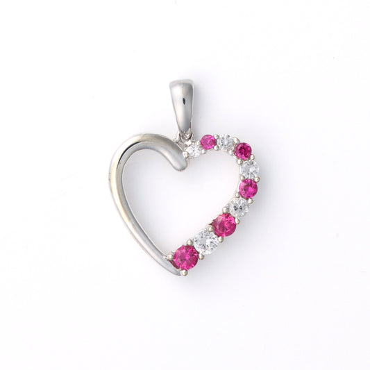 Heart-shaped pendant with sapphires and rubies.