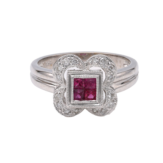 18K white gold ring, princess rubies, diamonds.