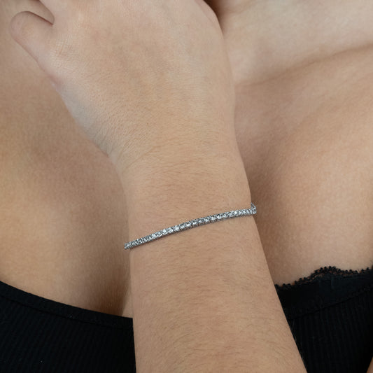 14K white gold diamond tennis bracelet.