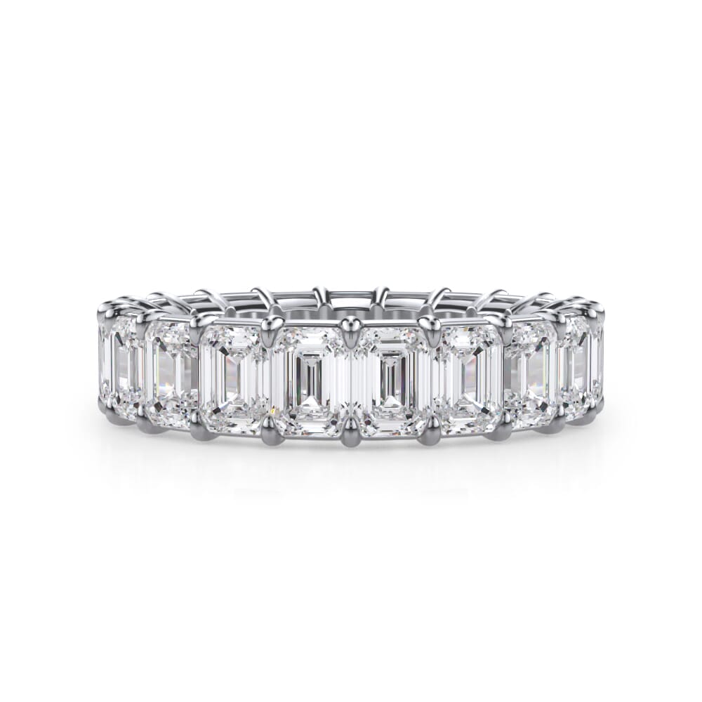 Emerald-cut diamond eternity band, white gold.