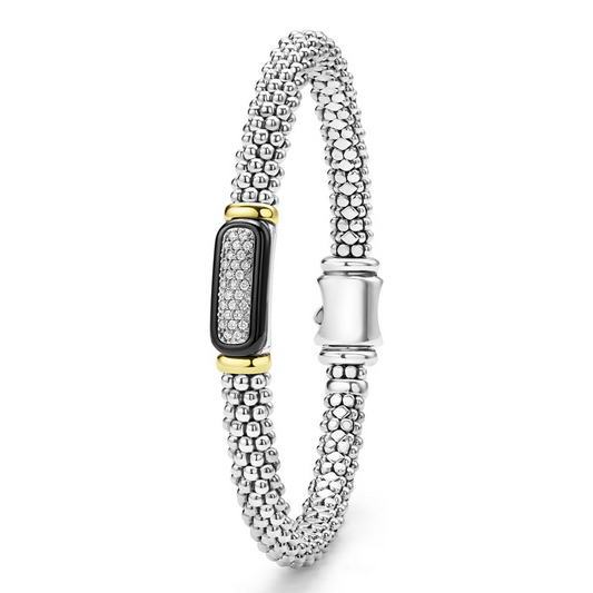 Sterling silver bracelet with diamond accents.