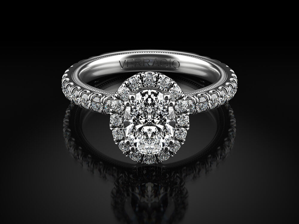 Halo diamond engagement ring with hidden accents.