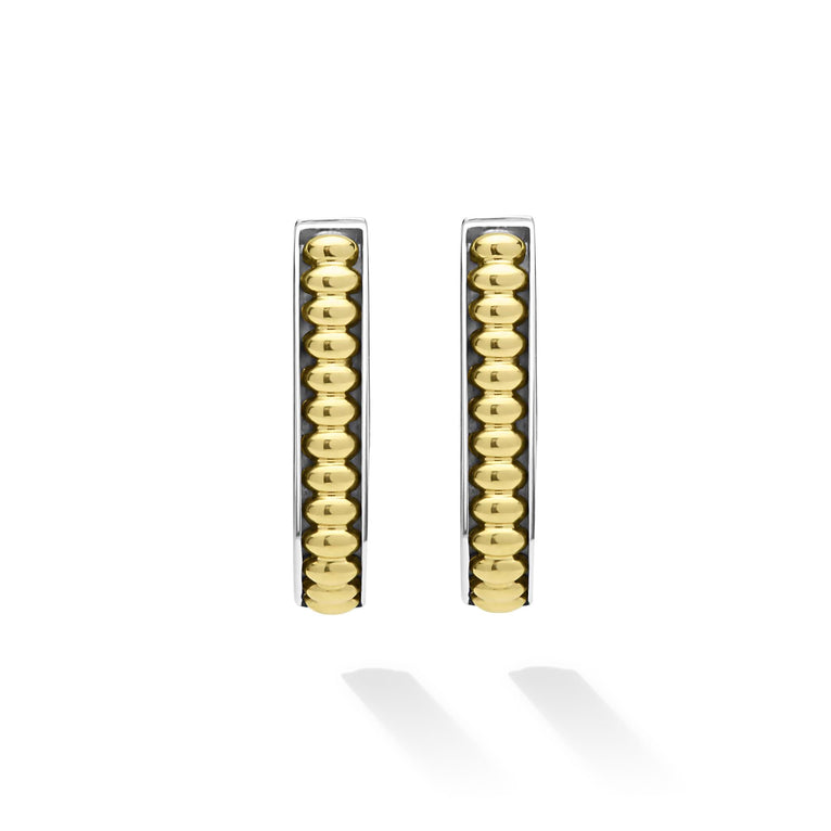 Sterling silver oval hoops with beaded design.