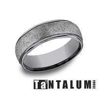 Tantalum grey carved band, polished finish.