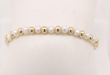 Gold-filled bracelet with yellow pearls.