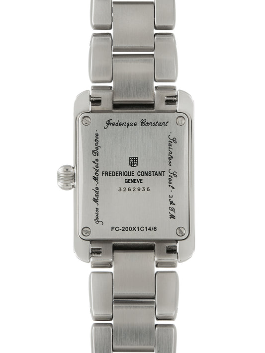 Stainless steel watch back with engraved details.