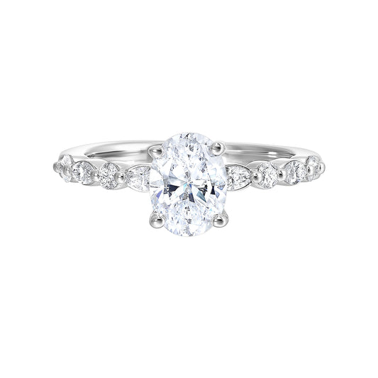 Vintage diamond ring with side stones, white gold.
