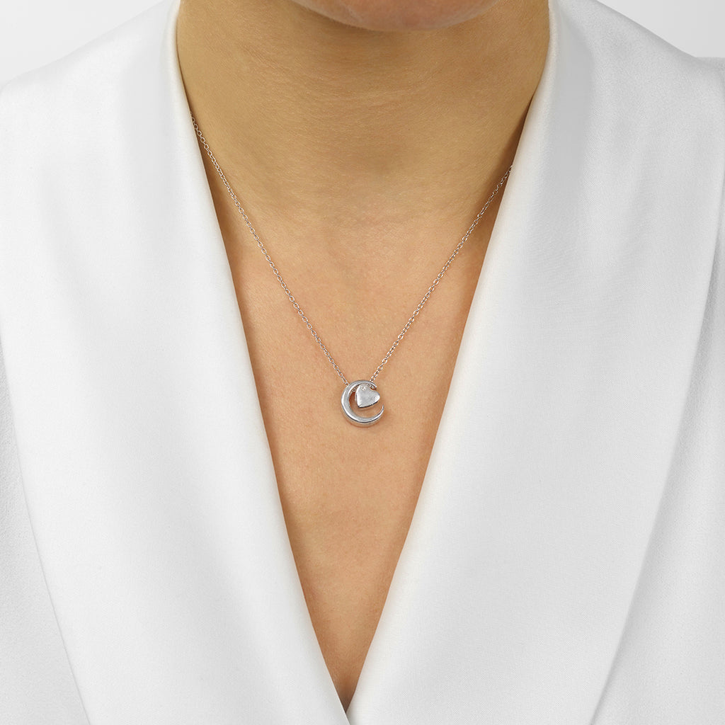 Sterling silver heart necklace with diamond.