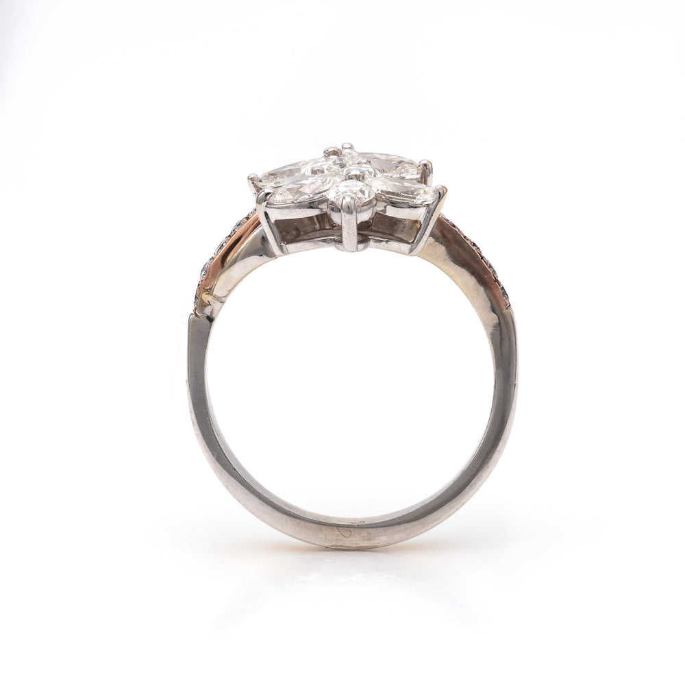 14K white gold ring with marquise diamonds.