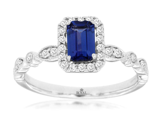 Emerald-cut tanzanite ring with diamond accents.
