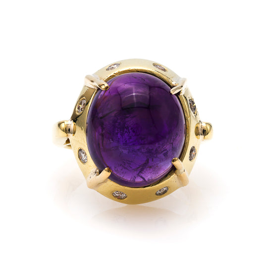 Cabochon amethyst ring with diamonds.