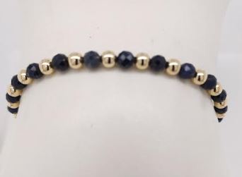 Gold-filled bracelet with round blue sapphires.