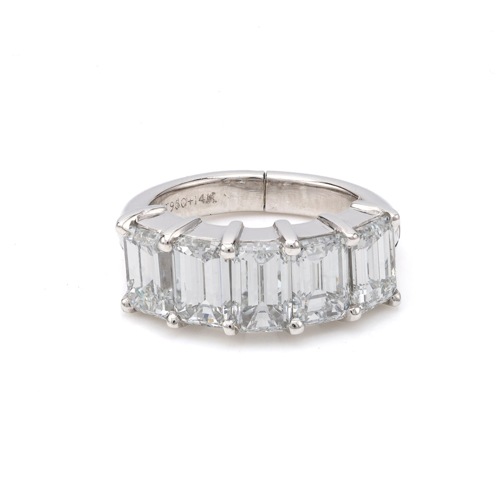 Seven-stone emerald-cut diamond ring.