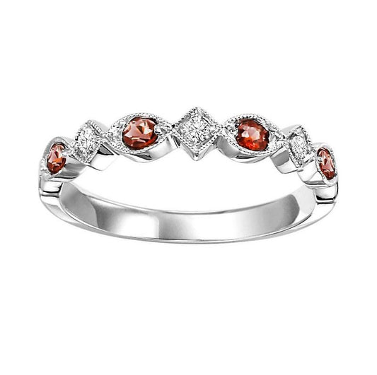 White gold band with garnets and diamonds.