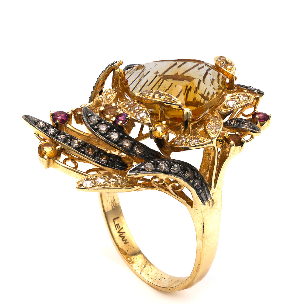 Fantasy Cut Citrine Ring with Diamonds and Garnets.