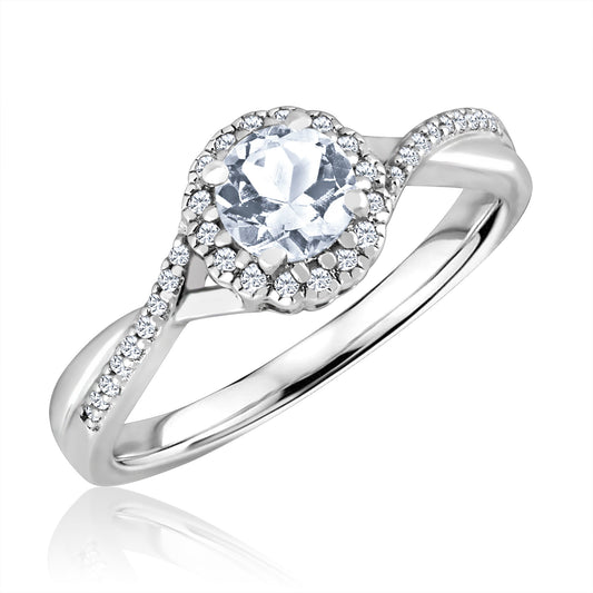Sterling silver ring with round white topaz.