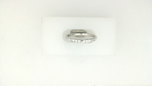14K white gold band with round diamonds.