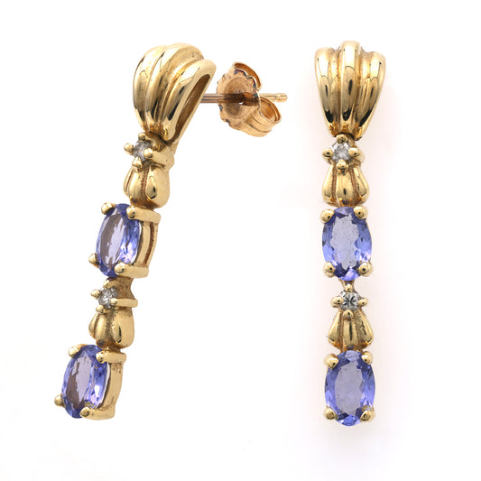 Tanzanite drop earrings in yellow gold.