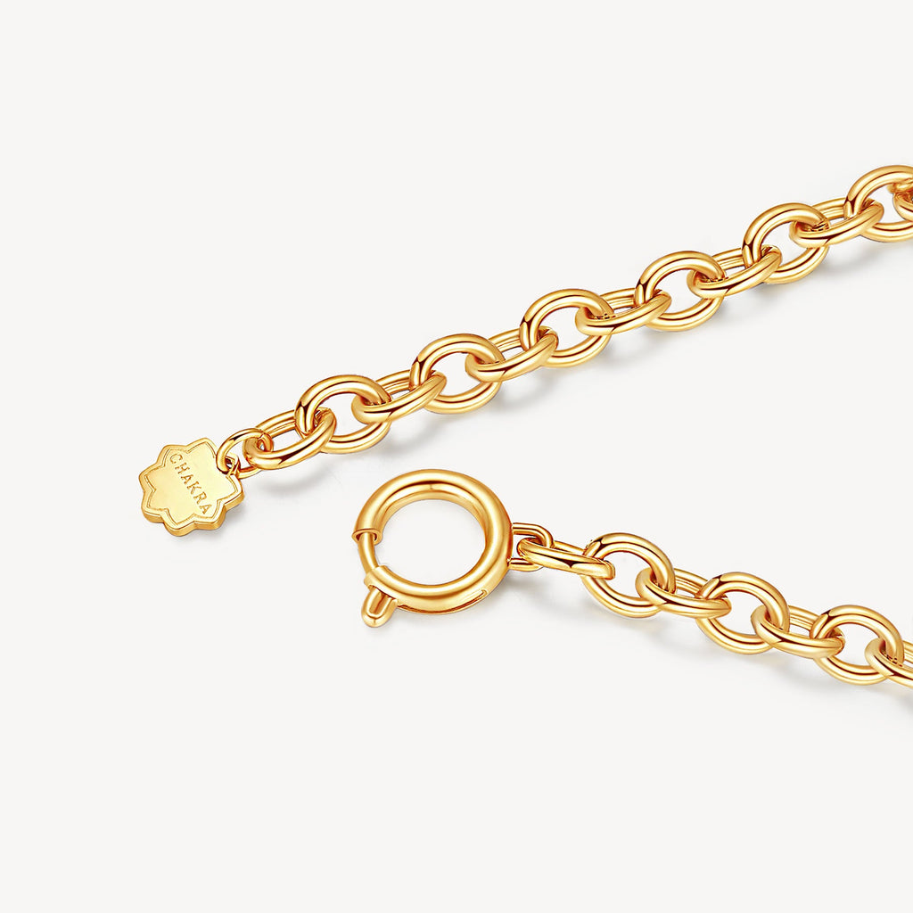 Yellow stainless steel bracelet with spring clasp.