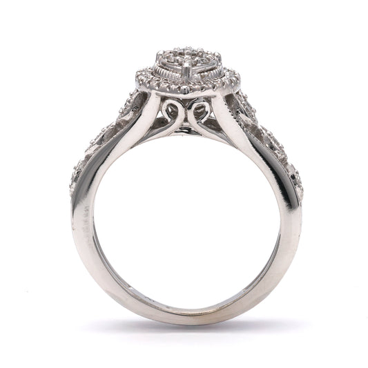 14K white gold diamond ring, intricate design.