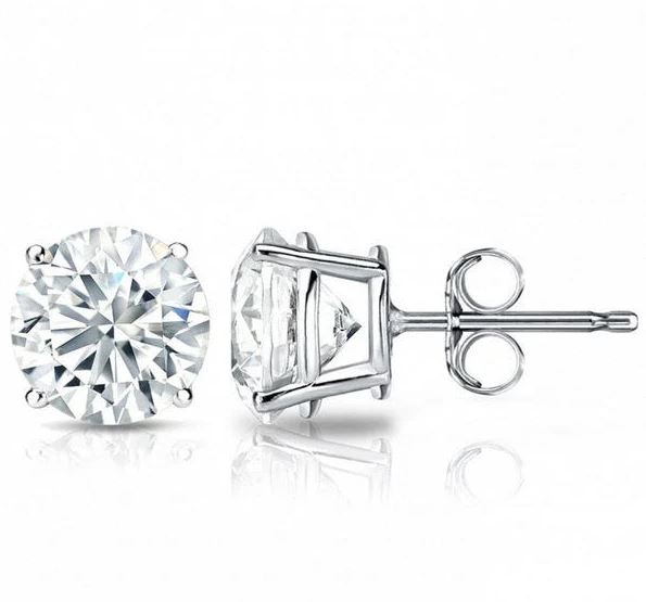 Round diamond studs in white gold setting.