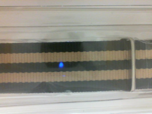 Black and beige striped nylon watch band.