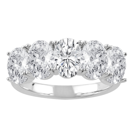 Oval diamond white gold wedding band.