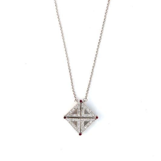Square diamond pendant with ruby accents.
