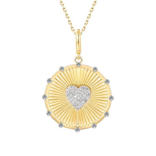 Heart-shaped diamond necklace, yellow gold, radiant design.
