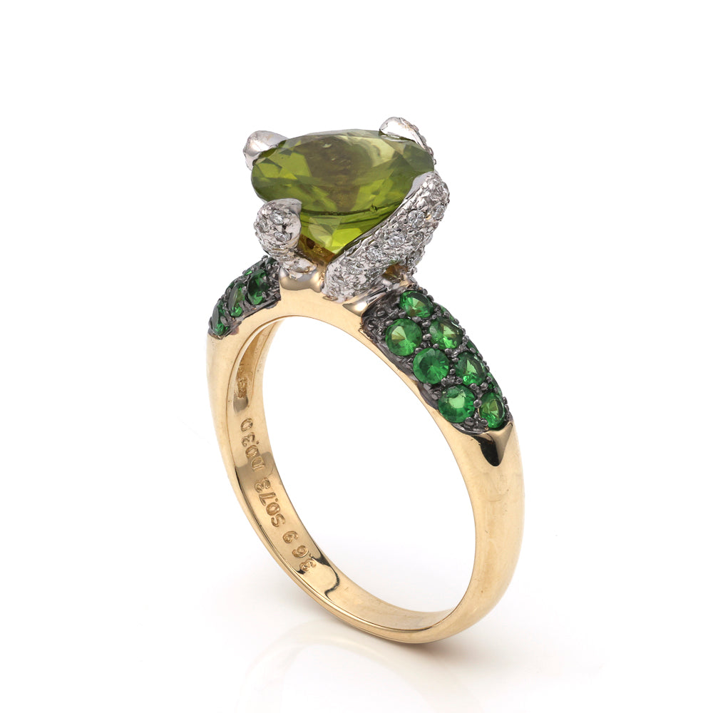 Peridot ring with diamonds and Tsavorite garnets.