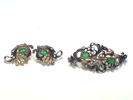 Georgian filigree pin with green simulated emeralds.