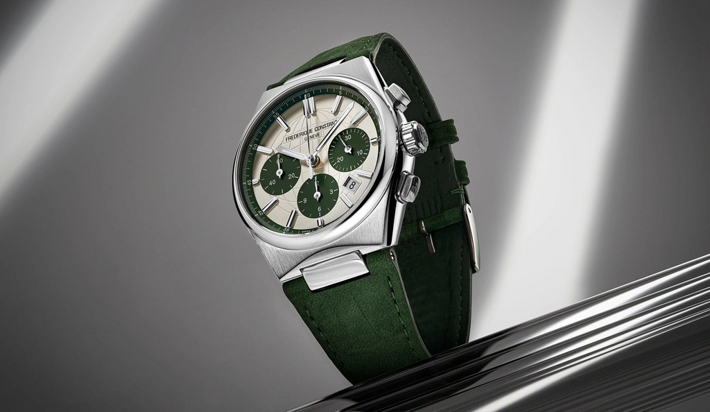 Green dial, stainless steel case, leather strap.