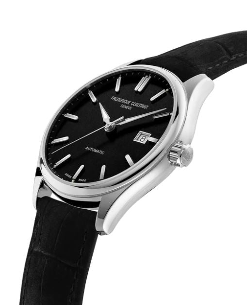 Black dial, stainless steel case, leather band.