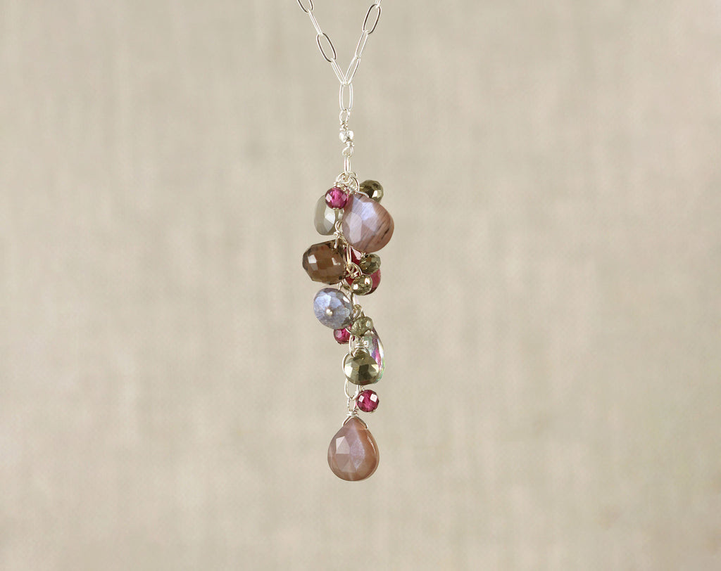 Sterling silver necklace with colorful gemstones.