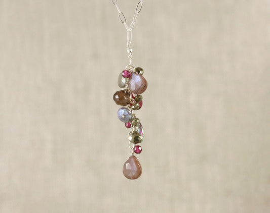 Sterling silver necklace with colorful gemstones.