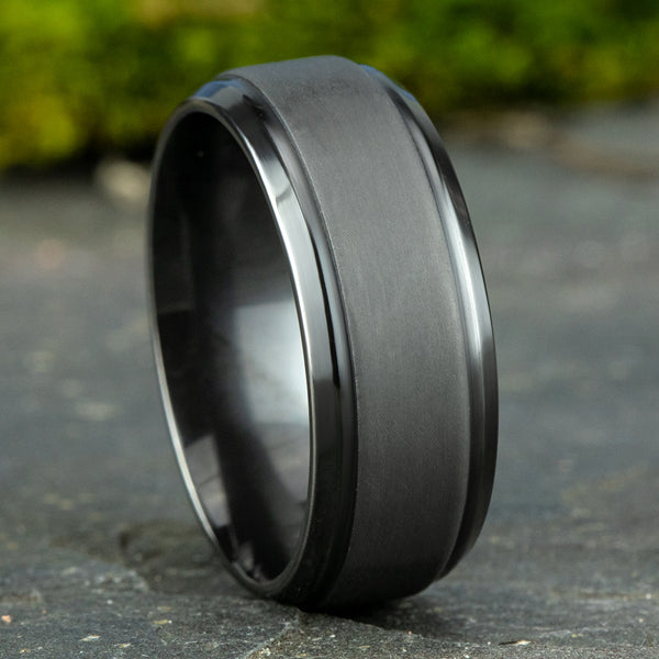 Tantalum grey carved band, polished satin finish.