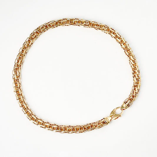 18K yellow gold fancy link chain.
