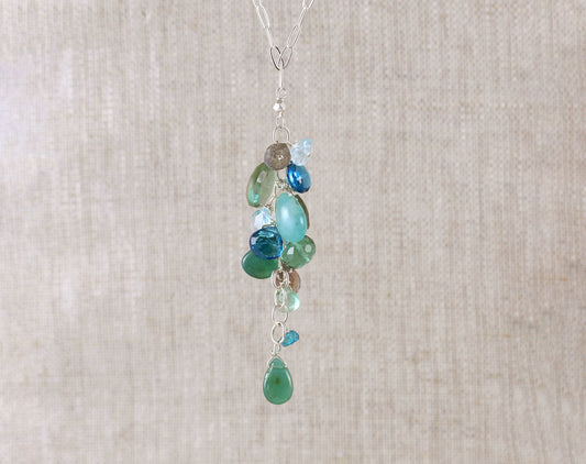 Sterling silver necklace with colorful gemstones.