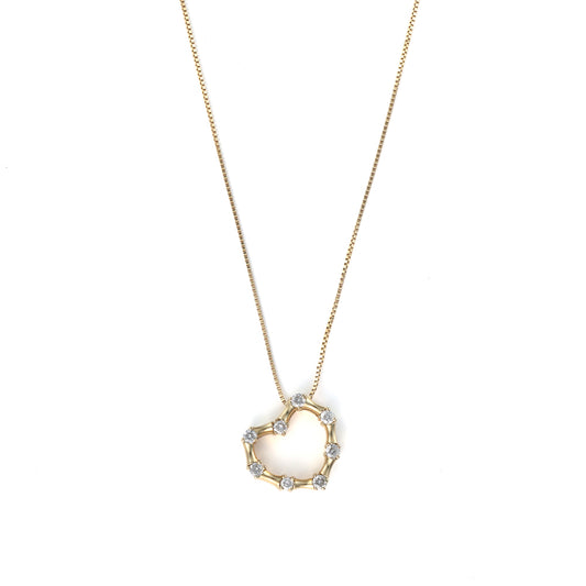 Heart-shaped yellow gold diamond necklace.