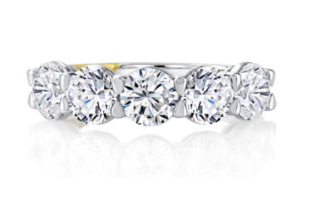 Five-diamond white-yellow gold wedding band.