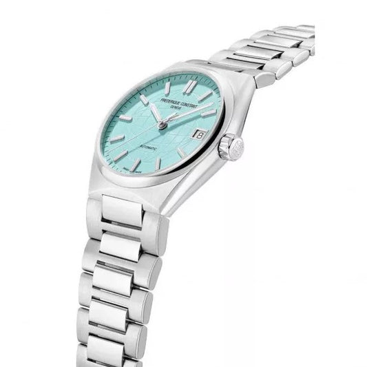 Stainless steel watch with turquoise dial.