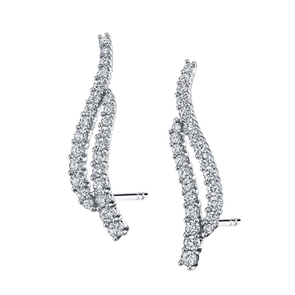 Diamond crawler earrings in white gold.