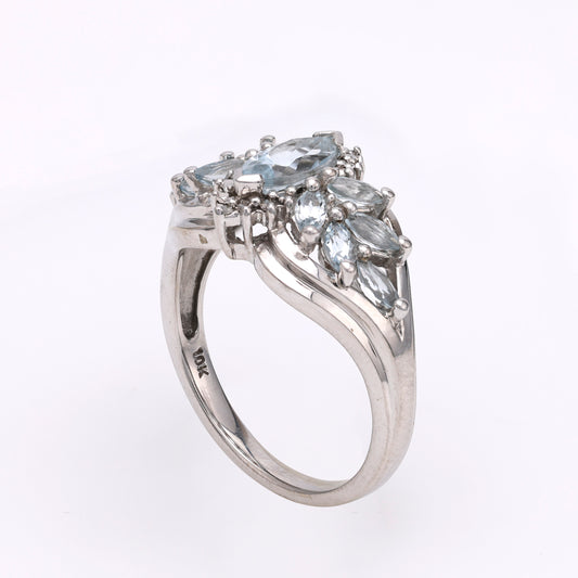 10K white gold ring with marquise aquamarines.