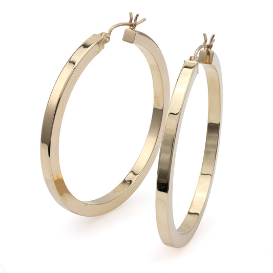 Polished 14K yellow gold large hoop earrings.