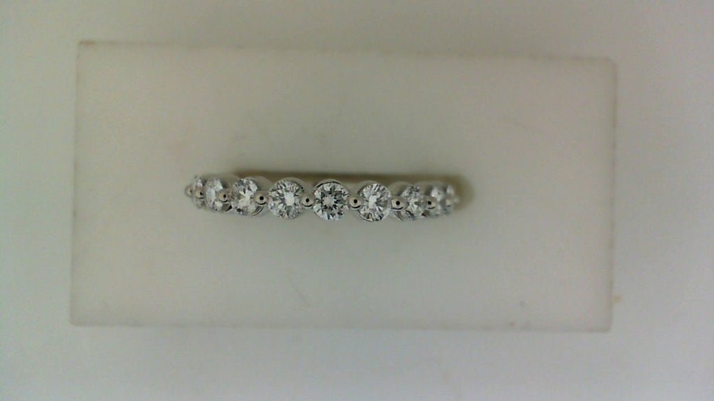 14K white gold band with round diamonds.
