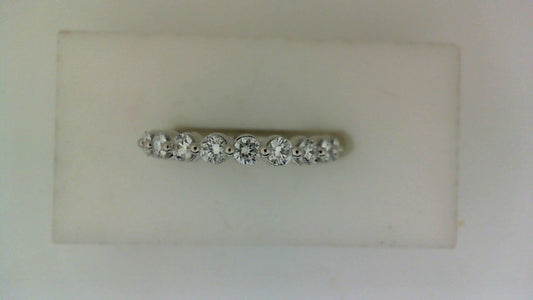 14K white gold band with round diamonds.