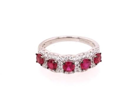 14K white gold band with round rubies.