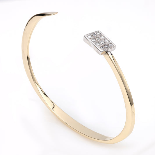 14K yellow gold cuff bracelet with diamonds.