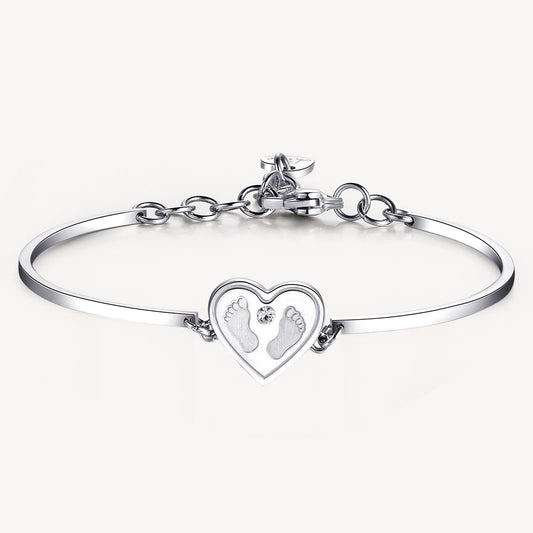 Stainless steel bracelet with heart and footprints.