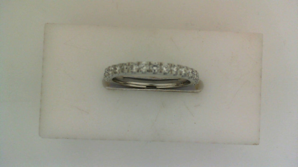 Platinum diamond band with round stones.